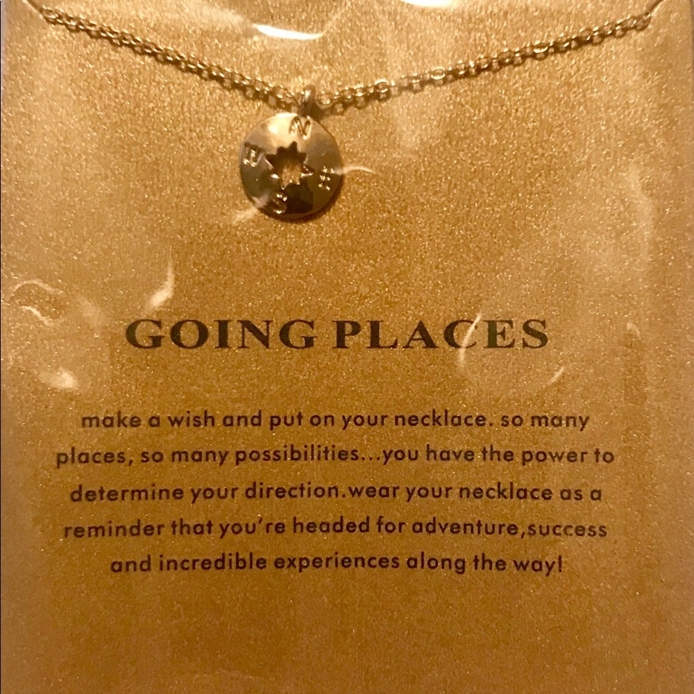 Cute gold necklace “going places”